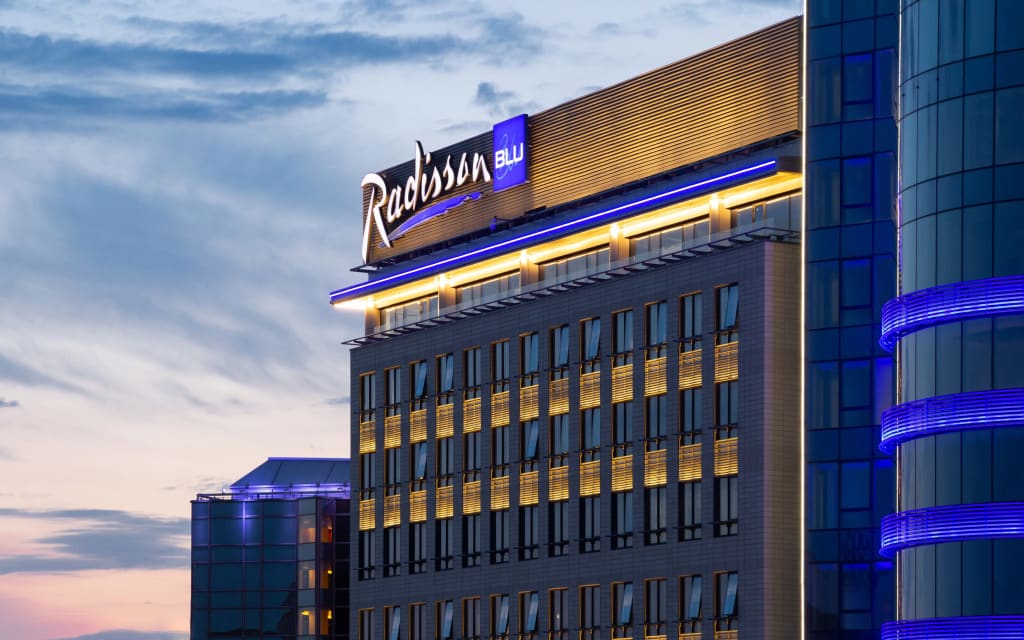 Отель Radisson Blu Olympiyskiy Hotel, Moscow фото